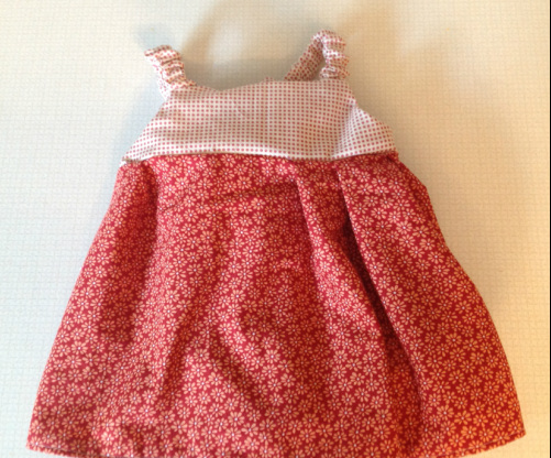Sweet little baby dress from free pattern and tutorial (LINK) found at See Kate Sew.